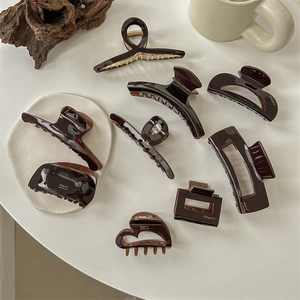 French style chocolate brown acetate hair claws and clips in various geometric shapes