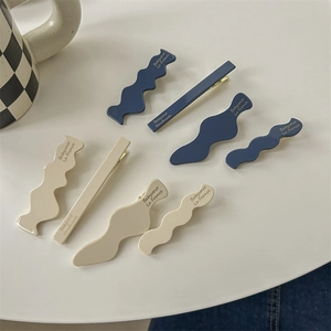 Blue and beige matte resin hair clip set with wave and straight shapes for women