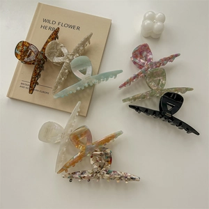 Elegant large acetate hair claws in 7 various marble and floral patterns for women