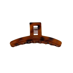 Elegant amber tortoiseshell acetate hair claw clip with vintage oil painting texture