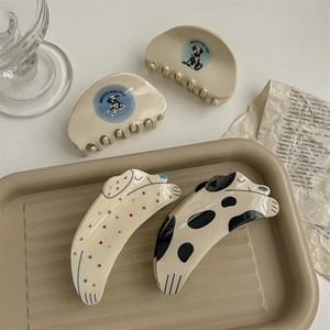Lot de quatre pinces à cheveux 3D dalmatien en beige et noir aux motifs rétro originaux