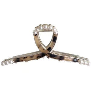 Elegant tortoiseshell acetate hair claw clip with white pearls for women hair styling