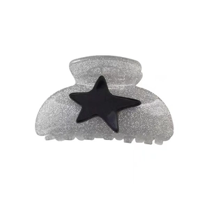 Y2K style glitter silver mini hair claw clip with a black star accent for women