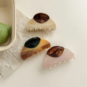French vintage wood grain acetate claw clips for hair in three bicolour pattern styles