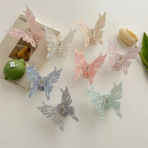 Pinces à cheveux papillon irisées en plusieurs couleurs avec une finition nacrée