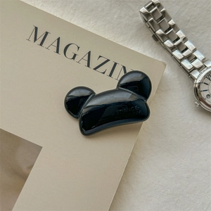 Détail de la pince à cheveux ours noir brillant avec gravure FRANCE Handmade sur la surface