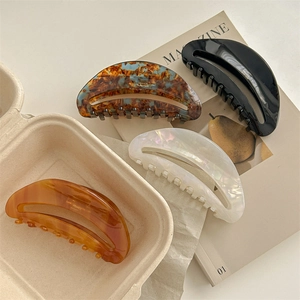 Elegant large acetic acid hair claws in four colors including tortoiseshell and pearl white
