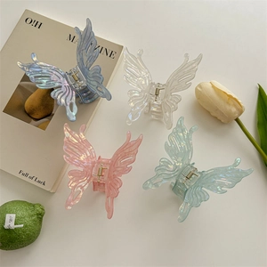 Lot de pinces à cheveux papillon irisées en bleu, blanc, rose et vert