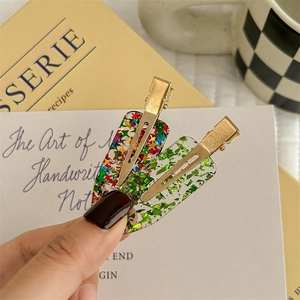 Set di mollette per capelli in acrilico trasparente con paillettes e clip in metallo oro
