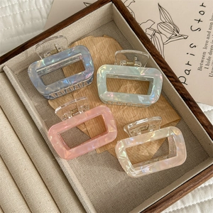 Set di eleganti mollette rettangolari in acetato con finitura iridescente perlata