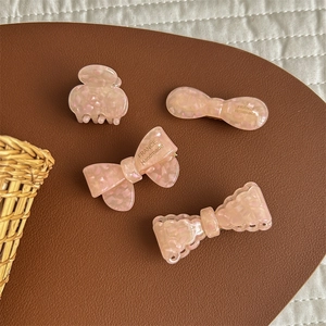 Pink pearlescent acetate bow hair clip set with glitter finish for girls
