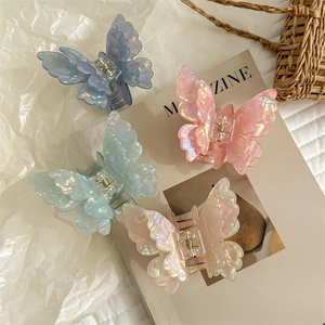 Chic iridescent double-layer butterfly hair claws in pastel colors for elegant updos
