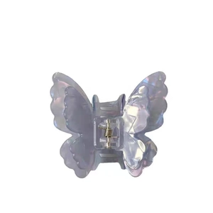 Iridescent lavender butterfly hair claw clip with a double-layered pearlescent finish