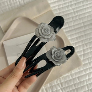 Elegant black hair claw clips with white marble camellia roses for women styling
