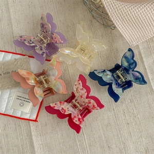 Five-piece set of premium acetate butterfly hair claws in vibrant marble and solid colors