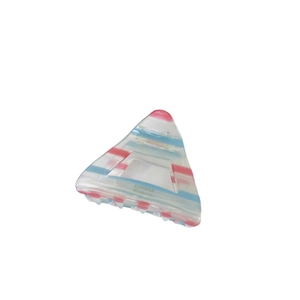 Acetate triangular hair claw clip with red and blue stripes and gold logo engraving