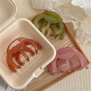 Three-piece set of large amber, green and pink jelly shark hair clips for thick hair