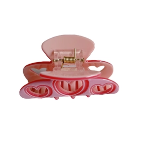 Sweet pink acetate heart cutout claw clip for women's hairstyling with metal spring