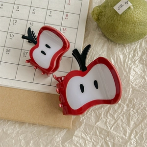 Creative apple-shaped acetate hair claw clips in red and white for women's hairstyling
