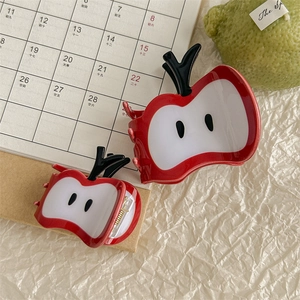 Cute red apple acetate hair claw set with two sizes on a minimalist background