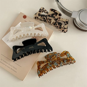 Set of four 13cm oversized French style hollow hair claws in tortoiseshell and solid colors