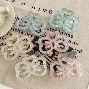 Elegant butterfly acrylic hair claws with pearl luster finish in various colors