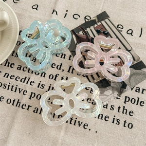 Elegant butterfly acrylic hair claws in pearlescent blue pink and white finishes