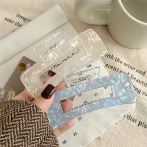 Acrylic square hair claws with iridescent pearl texture in blue and white colors