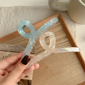 Iridescent ice blue and pearlescent cream large hair claws in high-quality resin