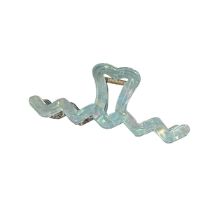 Iridescent oversized wave hair claw clip with heart handle in aurora light blue finish