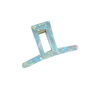 Pinza per capelli rettangolare in acrilico blu marmorizzato con molla in metallo dorato