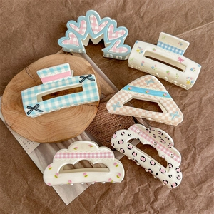 Floral and checkered acrylic large hair claw clips set in six different trendy styles