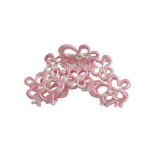 Elegante fermaglio per capelli a fiore in acetato con texture marmorea e strass