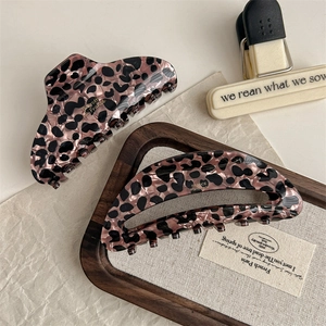 Pink leopard acetate hair claw clip set featuring rectangular and crescent shapes