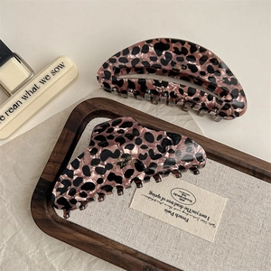 Large acetate leopard print shark hair clips in crescent and butterfly shapes
