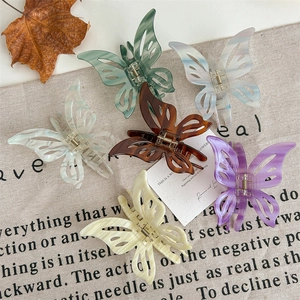Elegant hollow butterfly hair clips in six vintage colors for women's hairstyling
