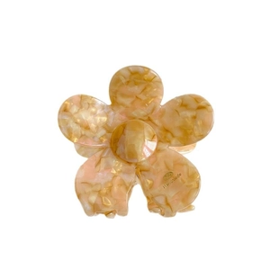 Elegant amber and beige acetate flower hair claw clip with marble texture and handmade mark