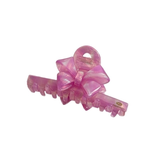 Pink marble acetate bow hair claw clip for women with elegant handmade gold logo detail