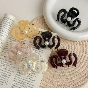 Elegant six-piece pearl hair claw set with wave pattern in assorted colors and acetate finish