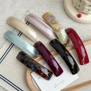 Set of 7 colorful handmade acetate curved hair clips with elegant tortoiseshell patterns