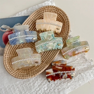 Elegant cellulose acetate pearl claw clip set in various marble patterns for women