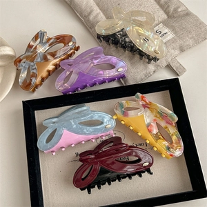 Set of large butterfly acetate hair claws in various colors and marble patterns