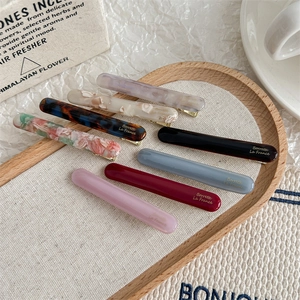 Set de 8 barrettes françaises en acétate aux motifs marbrés et couleurs unies pour la coiffure