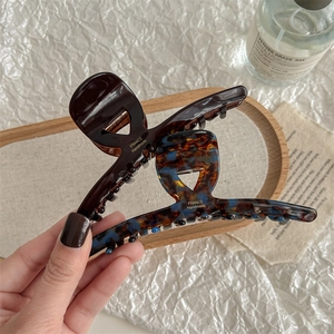 French handmade tortoiseshell hair claw clip in amber and blue acetate for women