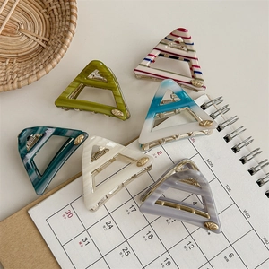 Set of six striped acetate triangle hair claws in multiple colors for stylish hair styling