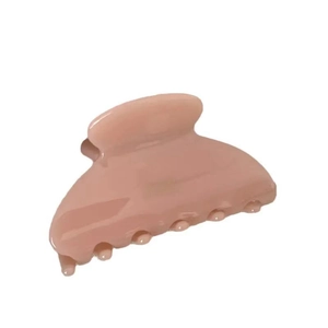 Elegant dusty pink acetate hair claw clip with a glossy finish for stylish ponytail styling