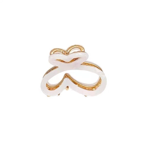 Elegant butterfly hair claw clip with golden metal base and white gradient resin finish