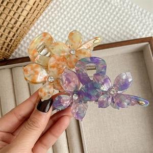 Pinces à cheveux fleurs en acétate élégantes avec strass en orange et bleu-violet