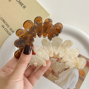 Exquisite acetate flower hair claw clips in amber and pearl white for thick hair styling
