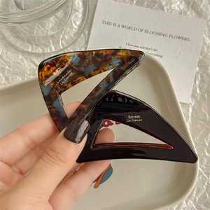 Elegant tortoiseshell and brown triangle acetate hair claw clips for French styling